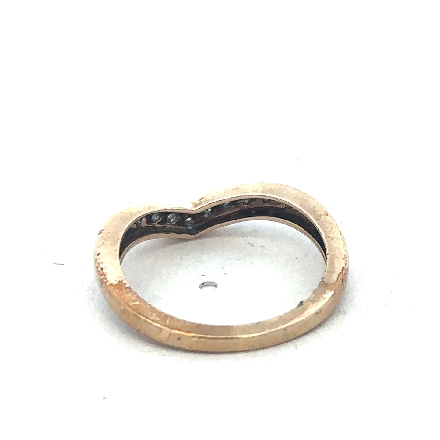 9ct yellow gold diamond wishbone ring by Reeves and Sons, showcasing a delicate gold band with sparkling diamonds.
