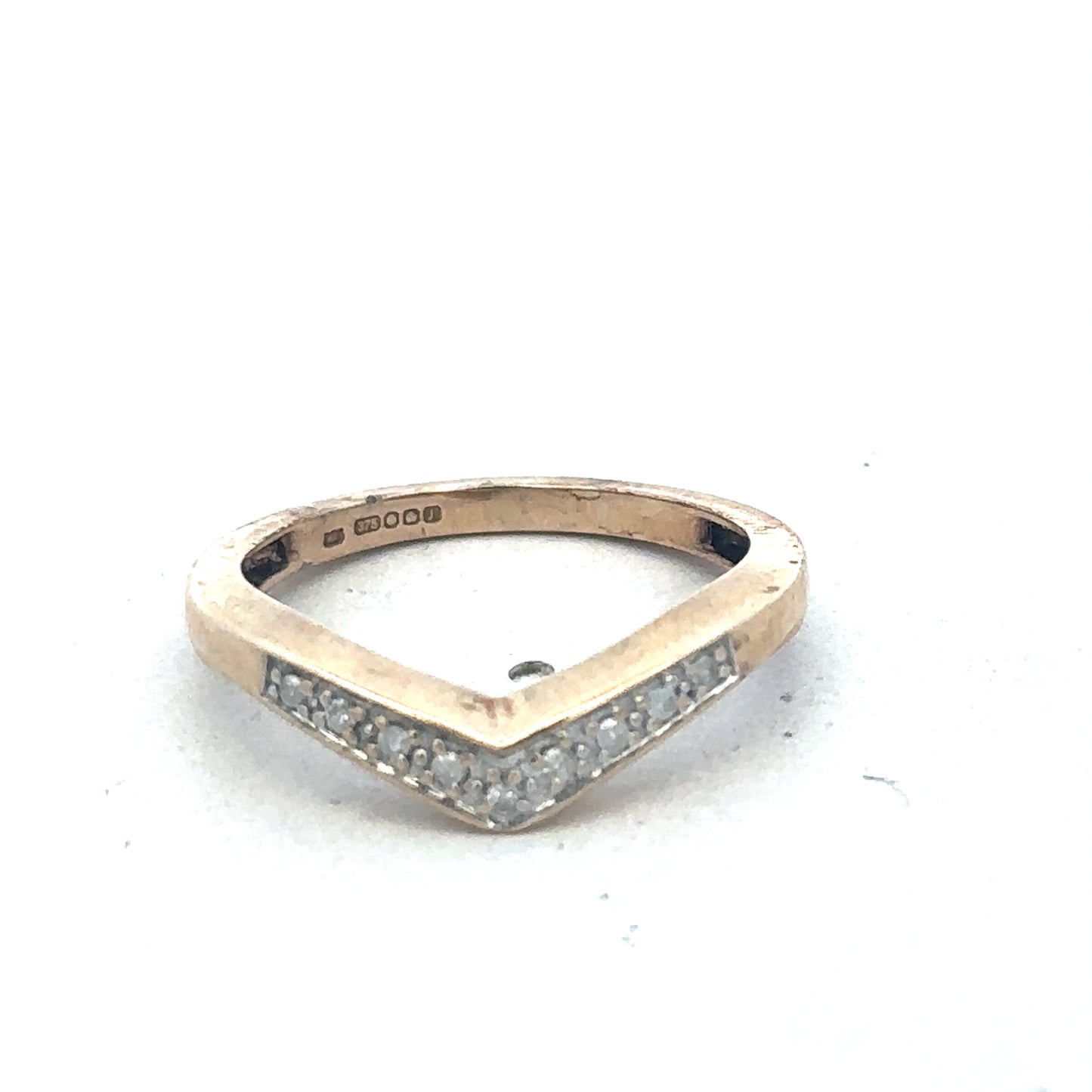 9ct yellow gold diamond wishbone ring by Reeves and Sons, featuring a delicate wishbone design with sparkling diamonds.