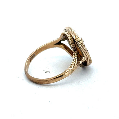 9ct gold Dos Pesos ring by Reeves and Sons featuring intricate design and polished finish.