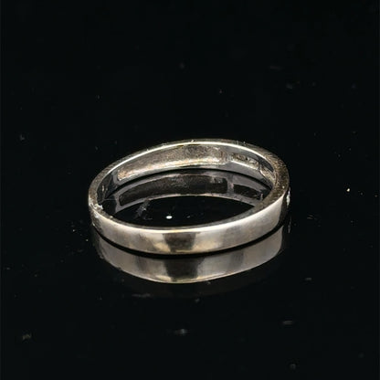 18ct white gold diamond half eternity ring with sparkling diamonds, showcasing elegant design and craftsmanship by Reeves and Sons.