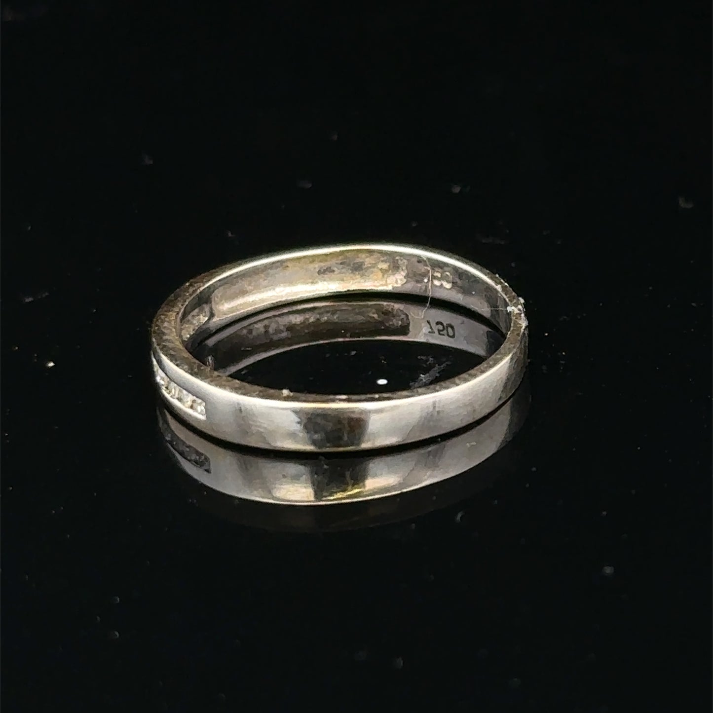 18ct white gold diamond half eternity ring by Reeves and Sons with sparkling diamonds around the band.