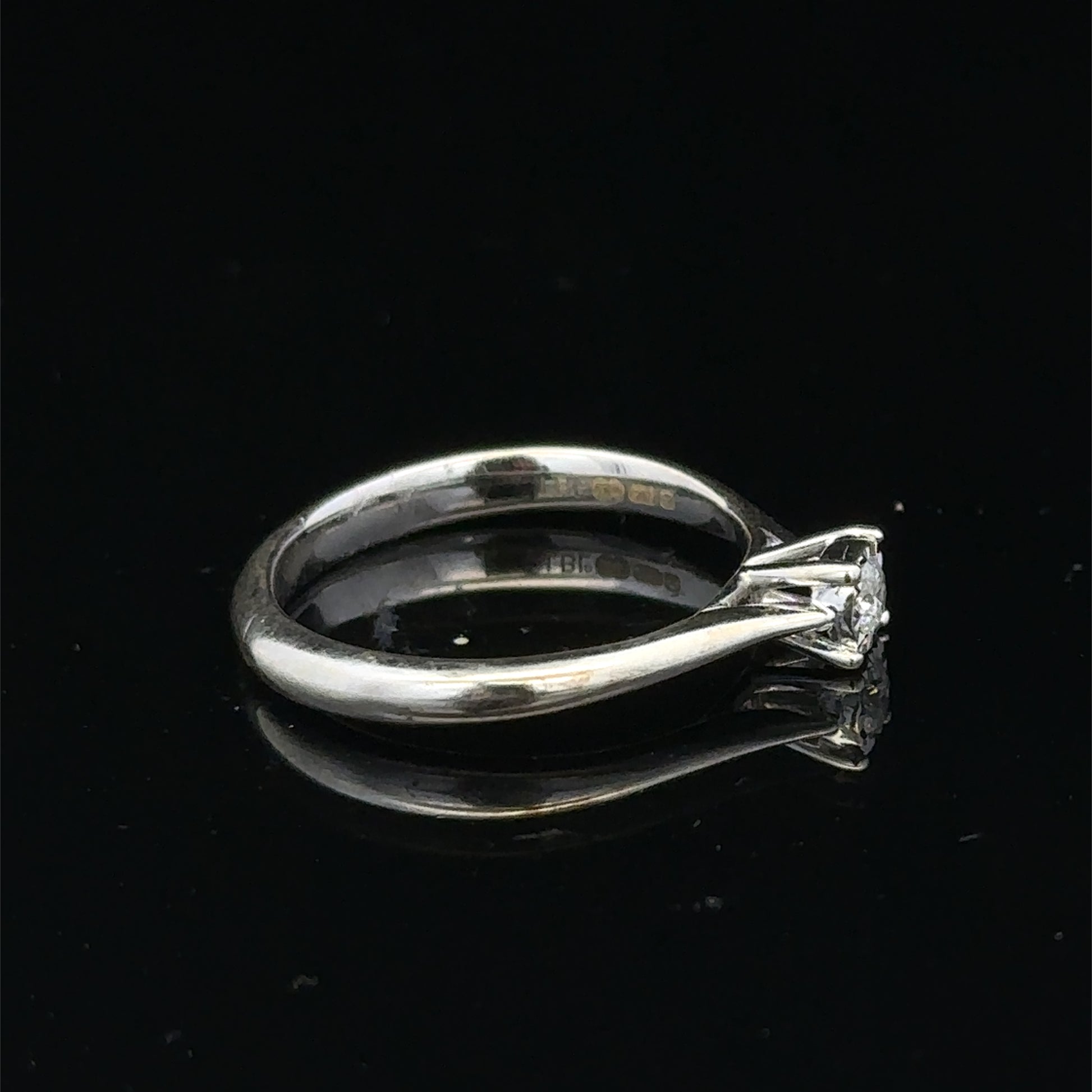 9ct white gold diamond solitaire ring featuring a single sparkling diamond, crafted by Reeves and Sons.