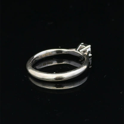 9ct white gold diamond solitaire ring by Reeves and Sons, featuring a single sparkling diamond on a sleek band.