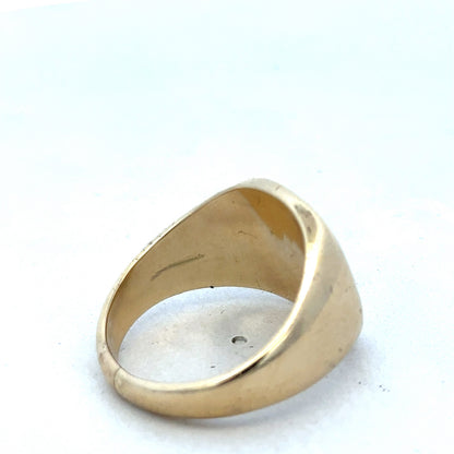 9ct yellow gold signet ring by Reeves and Sons, featuring a polished smooth top and classic design.
