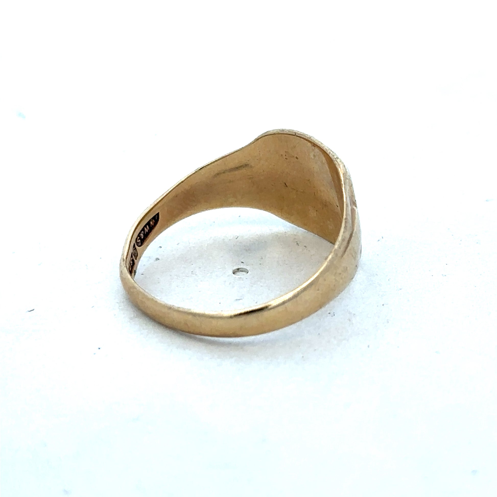 9ct yellow gold ring by Reeves and Sons, showcasing a smooth polished band with elegant craftsmanship and classic design.