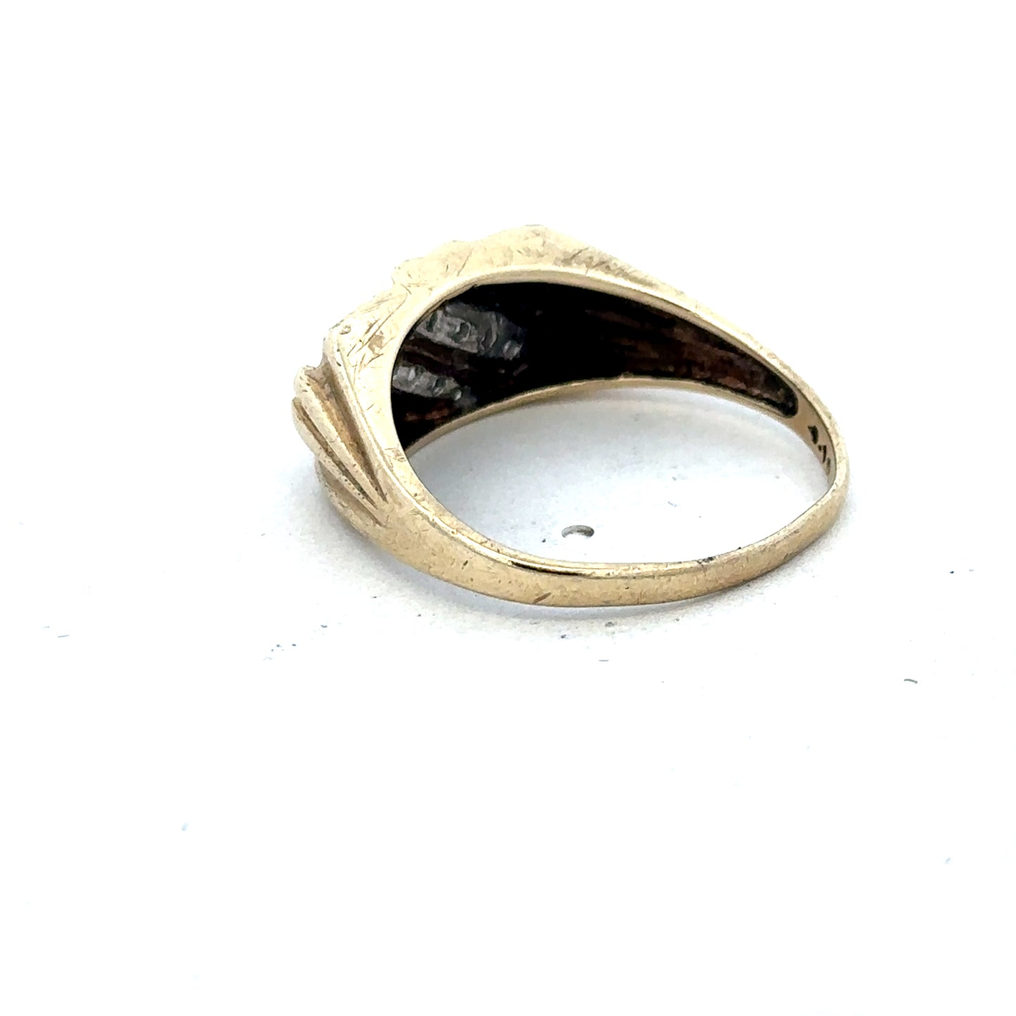 9ct yellow gold diamond ring by Reeves and Sons, featuring a sparkling diamond centerpiece and elegant design.