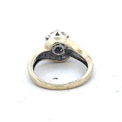 9ct yellow gold diamond ring by Reeves and Sons, featuring a sparkling diamond centerpiece and elegant band design.
