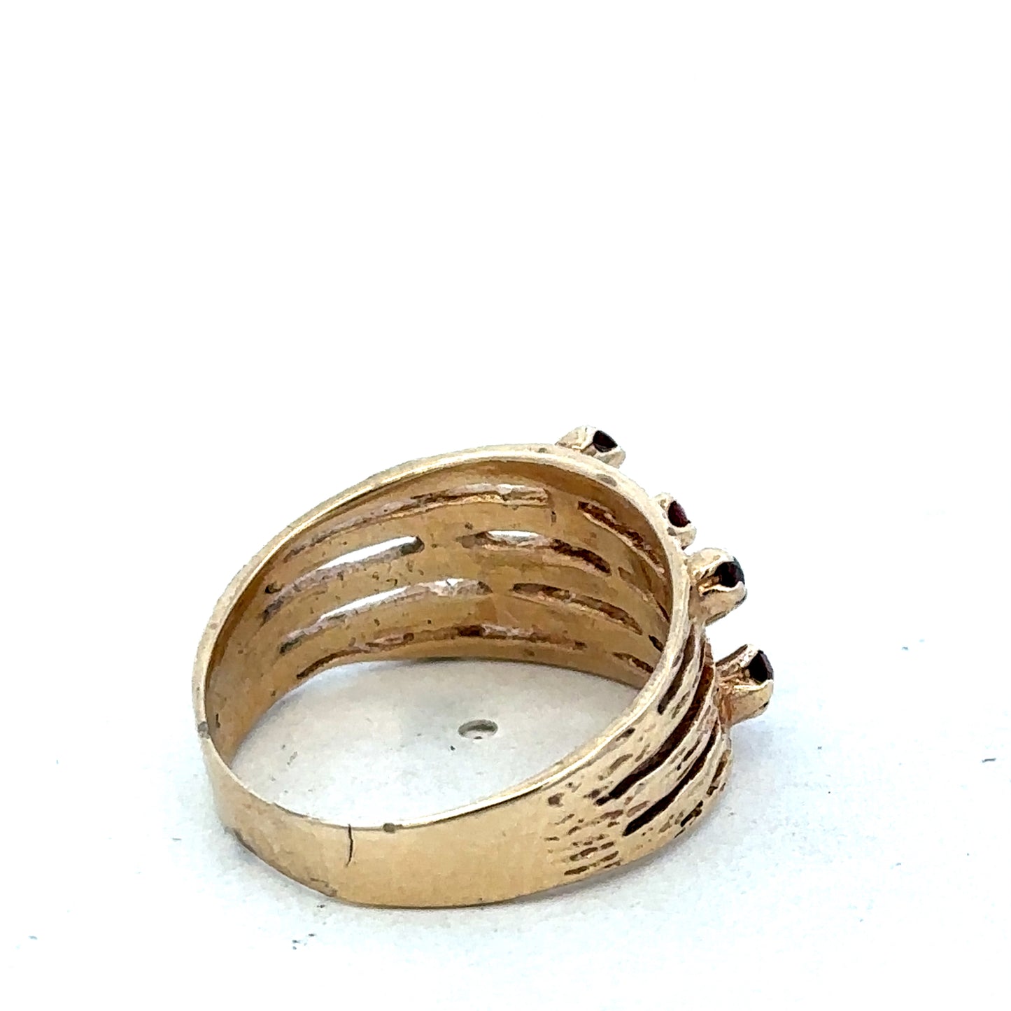 9ct yellow gold ring by Reeves and Sons, featuring a polished smooth band and elegant design.