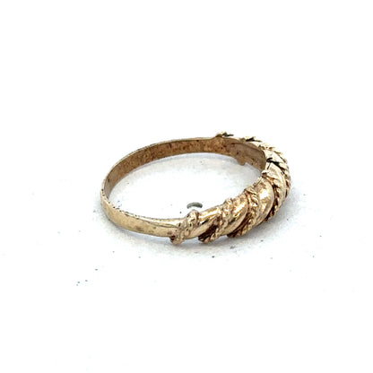 9ct yellow gold ring in size K with a polished finish, featuring a smooth band design by Reeves and Sons.