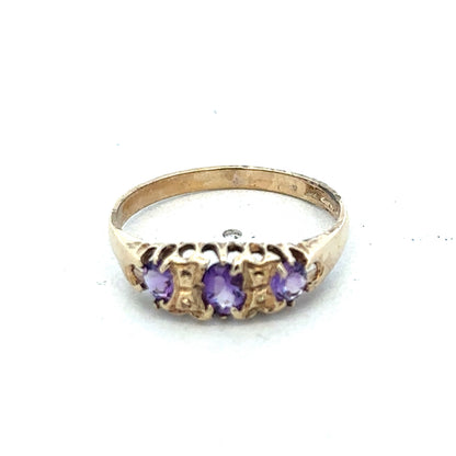 9ct yellow gold ring in size N with a smooth band, crafted by Reeves and Sons, displayed on a neutral background.