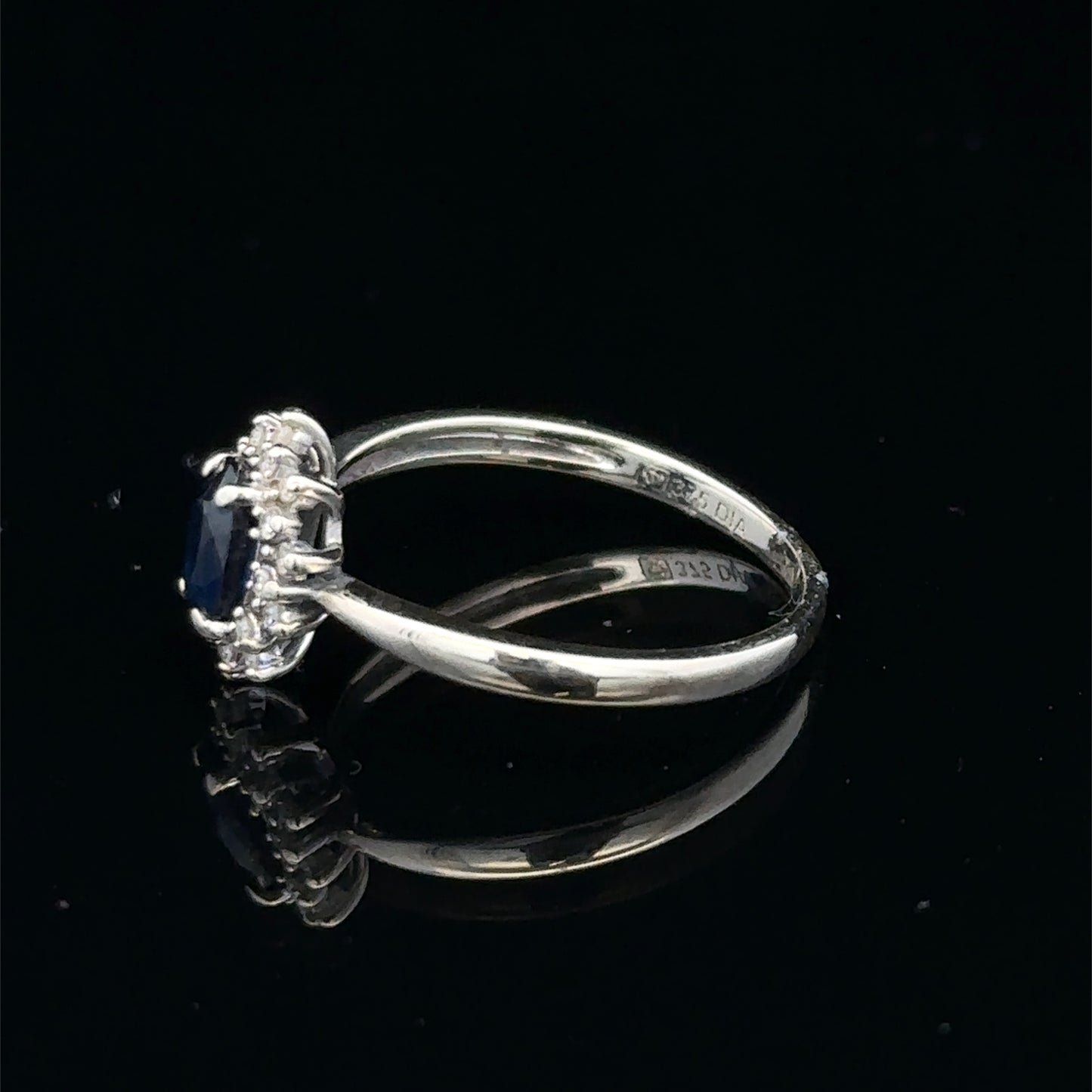 9ct white gold sapphire and diamond ring, size L, featuring a central sapphire gemstone with diamond accents, Reeves and Sons jewelry