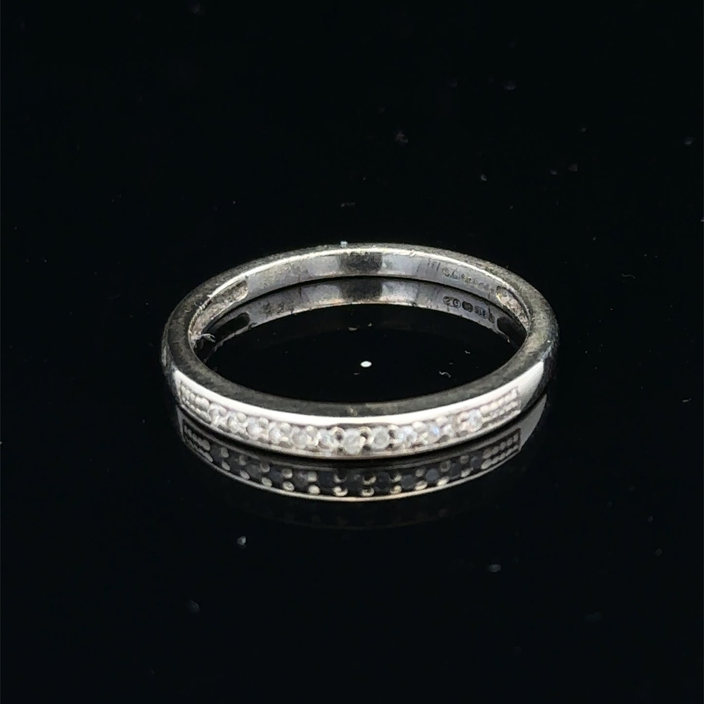 9ct white gold half eternity diamond ring with small sparkling diamonds, size N, by Reeves and Sons.