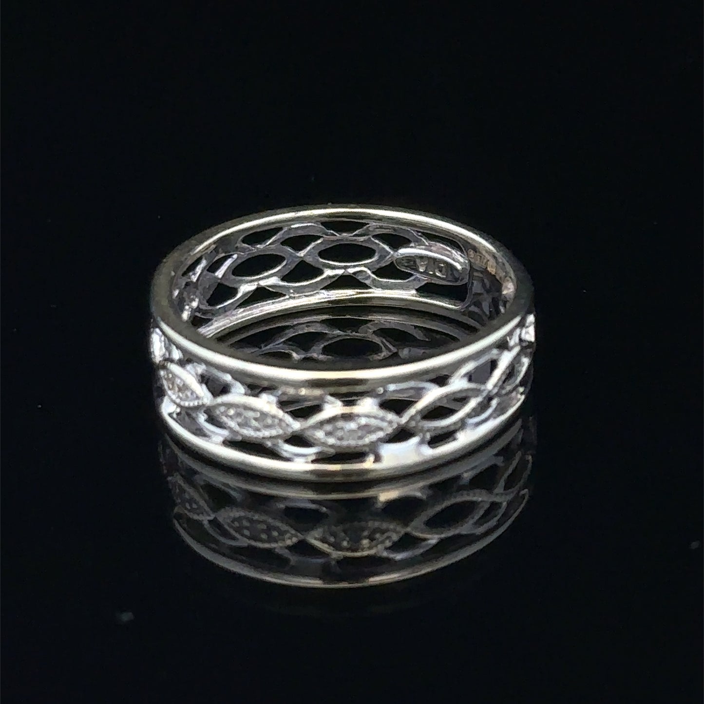 9ct white gold diamond ring in size L with sparkling diamonds, crafted by Reeves and Sons.
