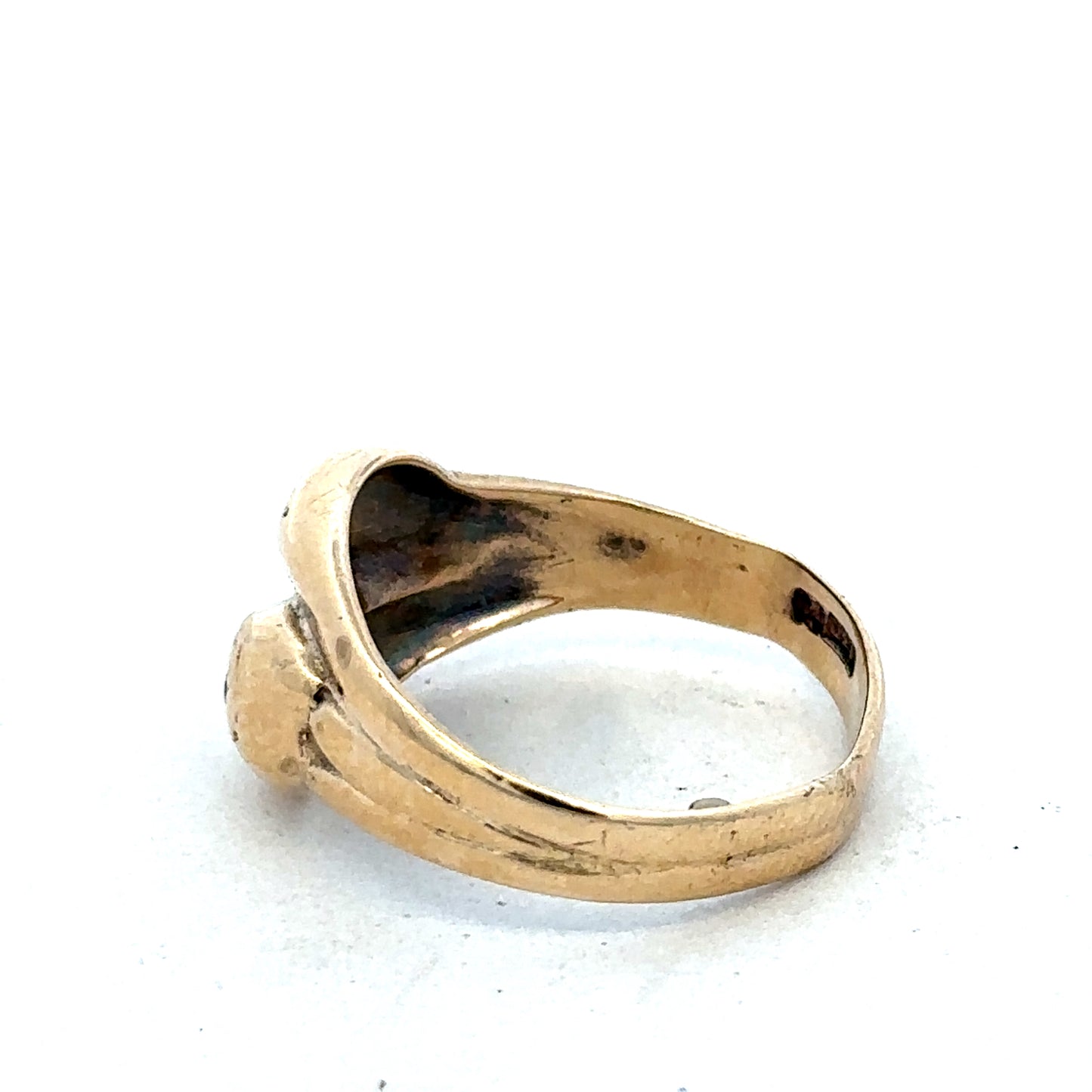 9ct yellow gold ring in size R by Reeves and Sons, showcasing a polished band with smooth finish.