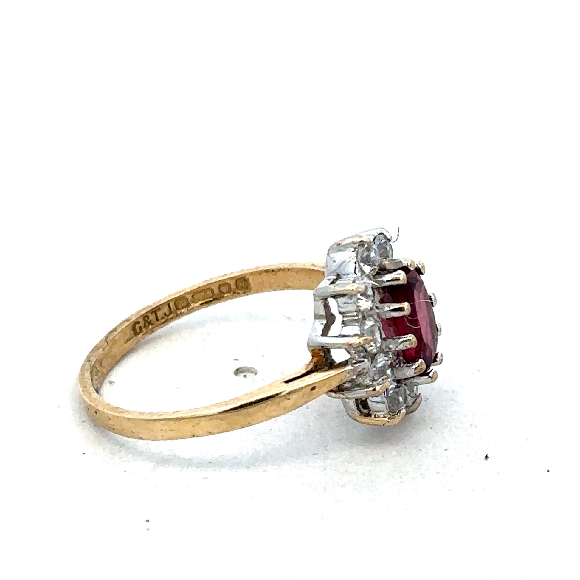 9ct yellow gold ring in size N with a smooth, polished band, crafted by Reeves and Sons.