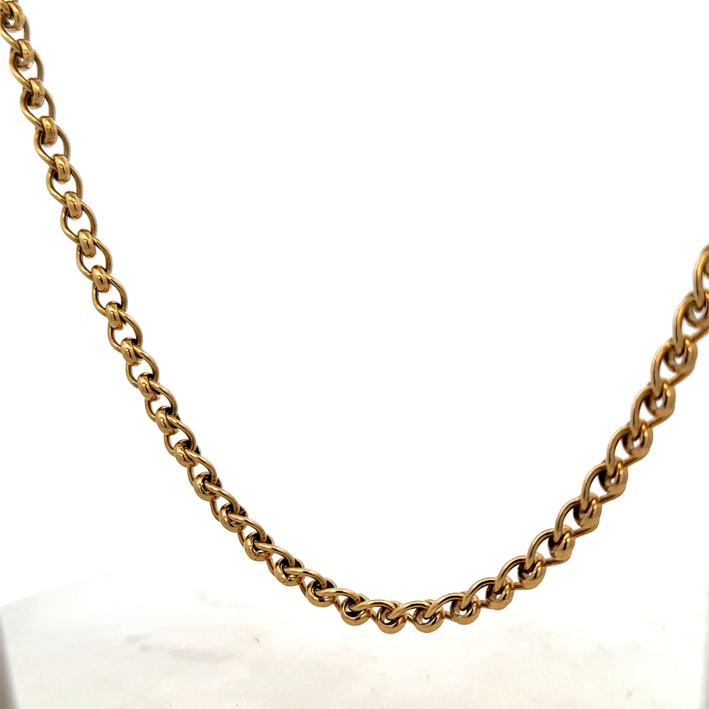 9ct yellow gold rollerball chain weighing 33.9g, featuring a shiny gold finish and intricate rollerball links.