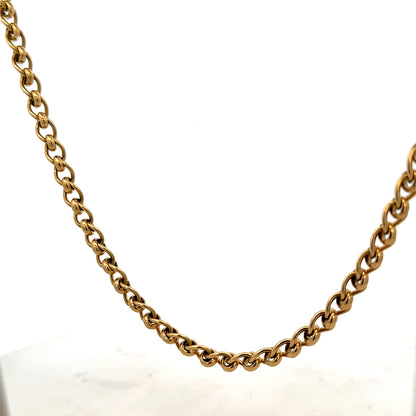 9ct yellow gold rollerball chain weighing 33.9g, featuring a shiny gold finish and intricate rollerball links.