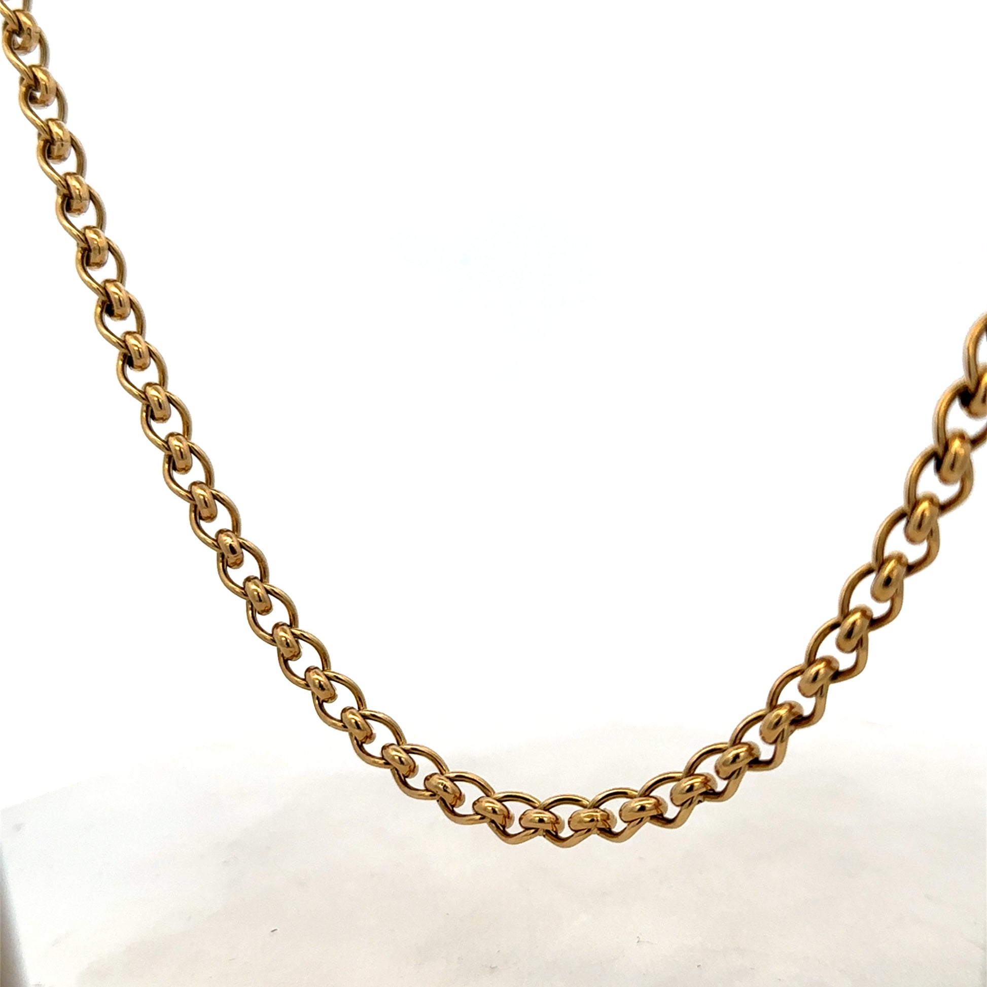 Reeves and Sons 9ct yellow gold rollerball chain, 33.9g, close-up showing detailed gold chain links.