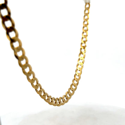 9ct yellow gold curb chain weighing 26.5g, featuring classic interlinked oval links, crafted by Reeves and Sons.