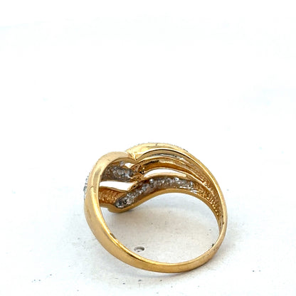 18ct yellow gold diamond ring by Reeves and Sons with sparkling diamonds, showcasing elegant craftsmanship and luxurious design.