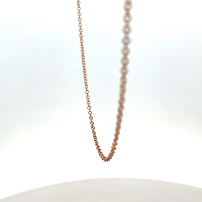 9ct gold chain weighing 4.4g by Reeves and Sons, featuring a detailed link design, shown in a close-up image.