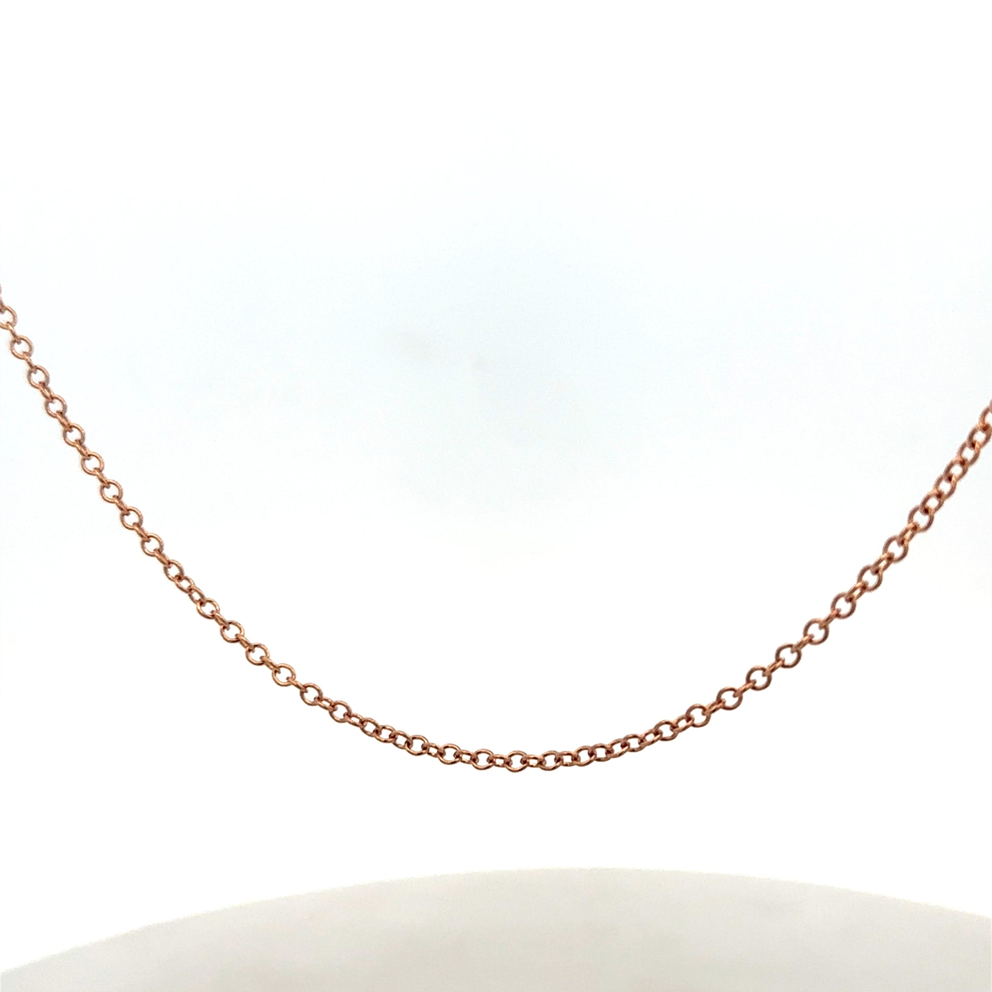 9ct gold chain weighing 4.4g with a detailed link design, crafted by Reeves and Sons.