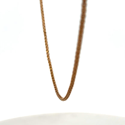 9ct yellow gold chain from Reeves and Sons, shown with a close-up of the smooth, polished link design.