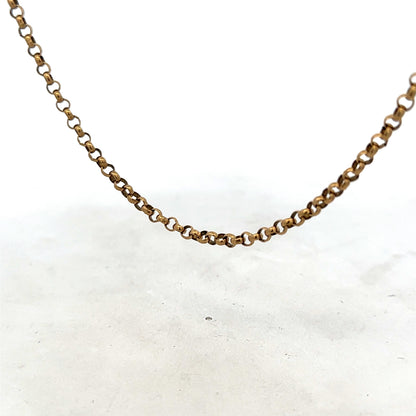 9ct yellow gold belcher chain from Reeves and Sons, showing its textured links and polished finish.