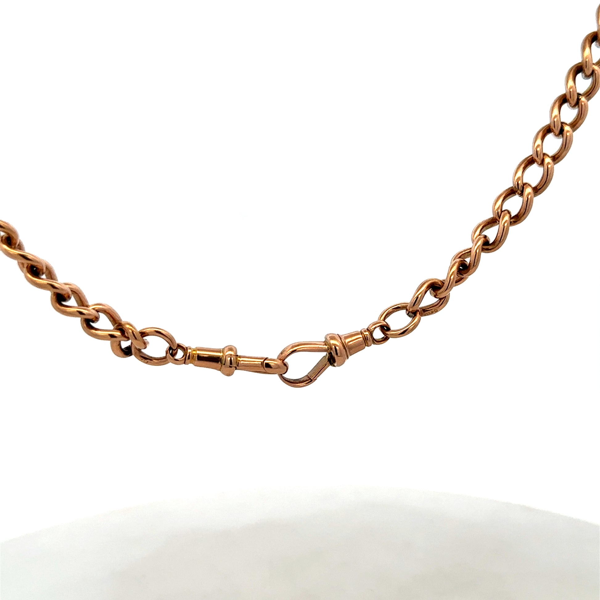 Reeves and Sons 9ct yellow gold bracelet weighing 31.3g, featuring a sleek chain design with polished finish.
