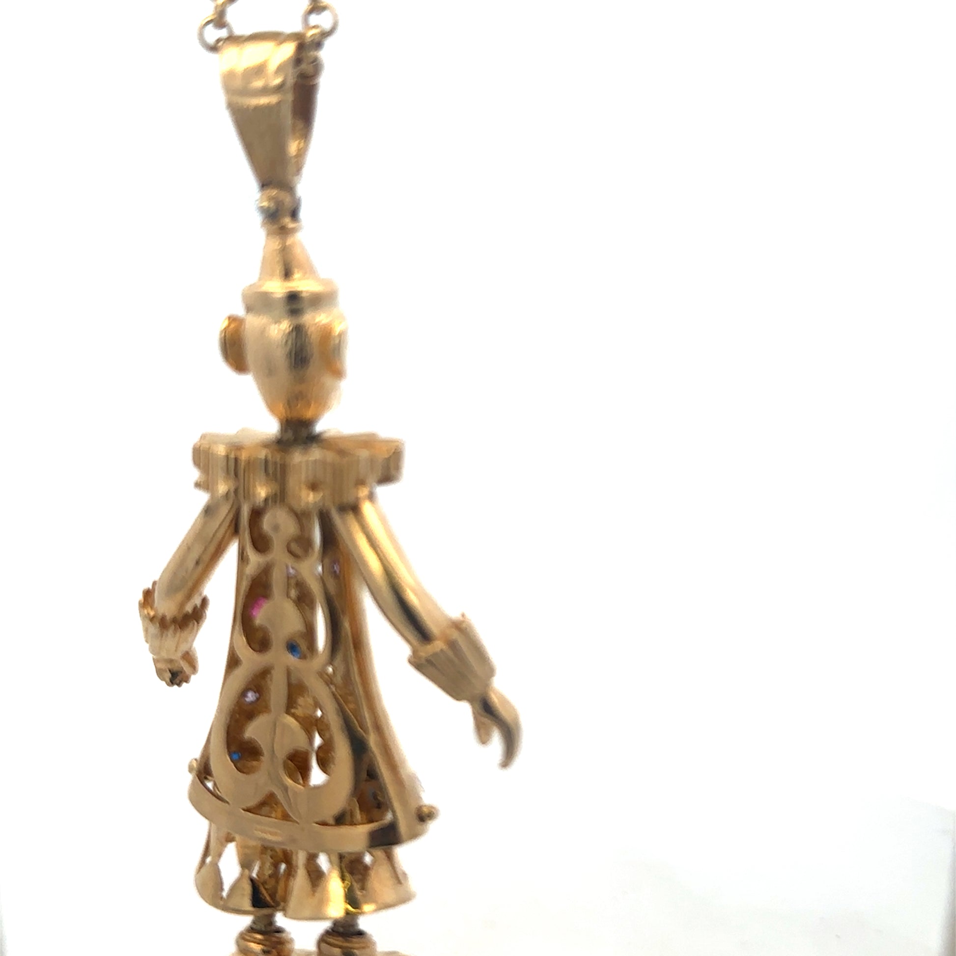 9ct yellow gold clown pendant with intricate details, weighing 42.5g, from Reeves and Sons.