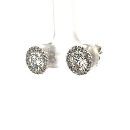 18ct white gold lab-grown diamond stud earrings by Reeves and Sons, featuring sparkling diamonds and a sleek design.
