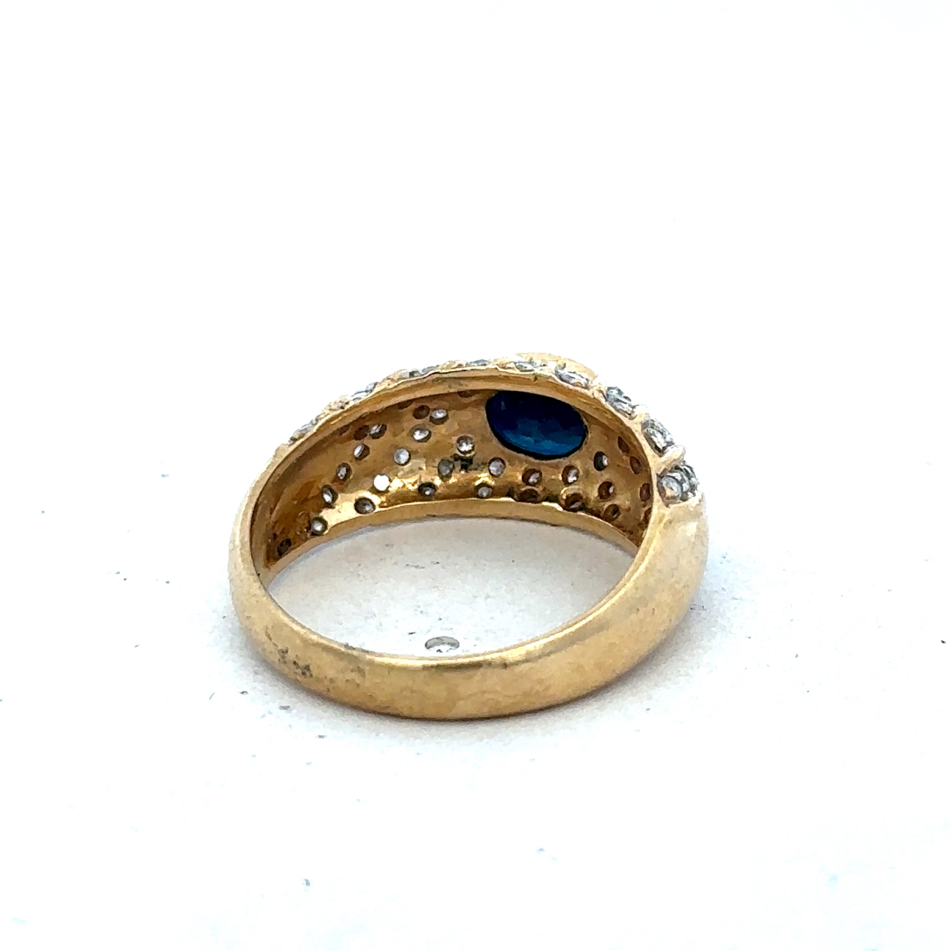 18ct yellow gold diamond ring in size P by Reeves and Sons, featuring a delicate band with sparkling diamonds.