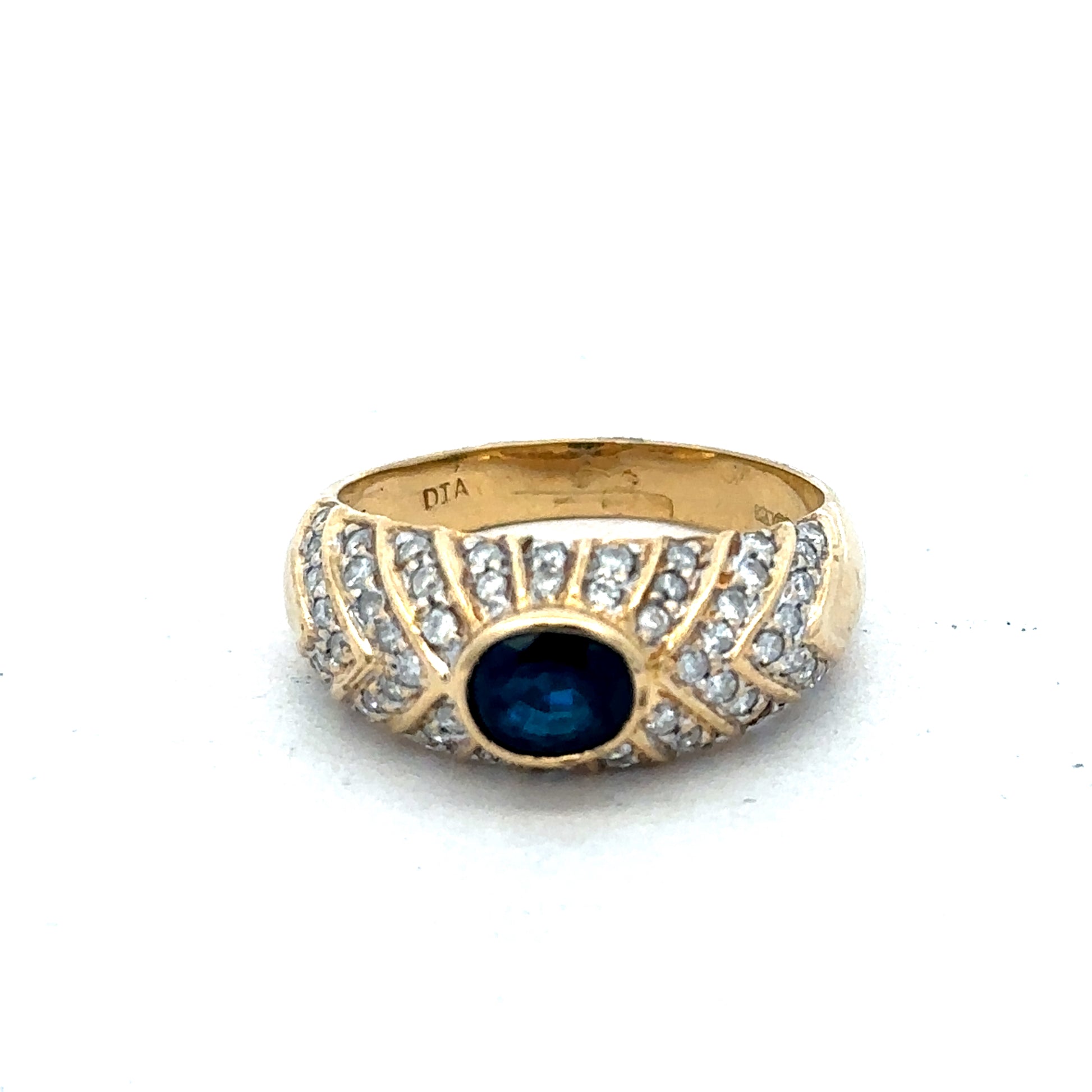 18ct yellow gold diamond ring in size P with sparkling diamonds, by Reeves and Sons, shown on a neutral background.
