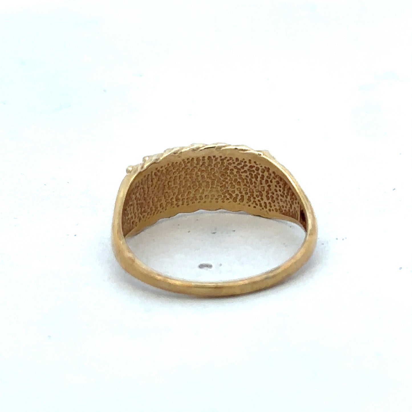 9ct yellow gold keeper ring size W from Reeves and Sons, close-up showing smooth band and polished finish.