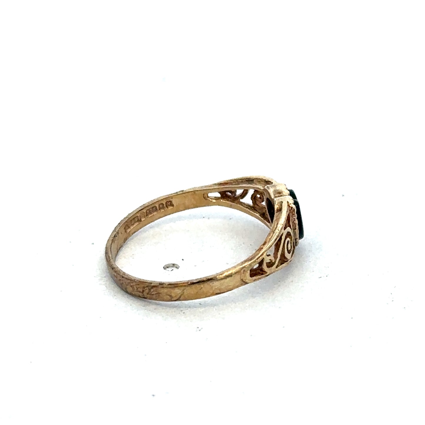 9ct yellow gold ring in size L with a smooth polished band, featuring a sleek and classic design by Reeves and Sons.