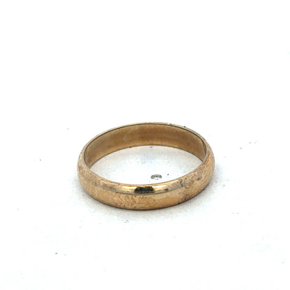 9ct yellow gold band ring in size N by Reeves and Sons, smooth polished finish, close-up view of the elegant jewelry piece.