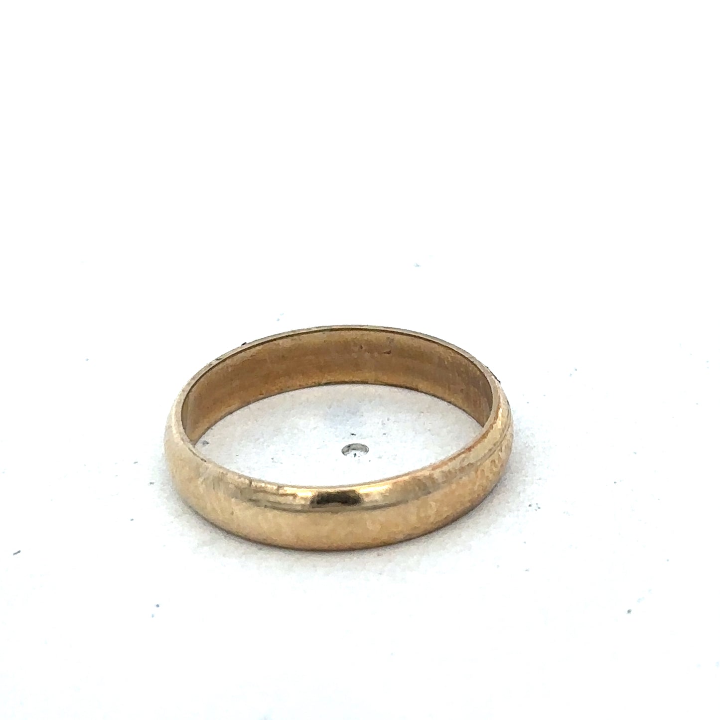 9ct yellow gold band ring in size N with smooth polished finish, featuring a classic design by Reeves and Sons.