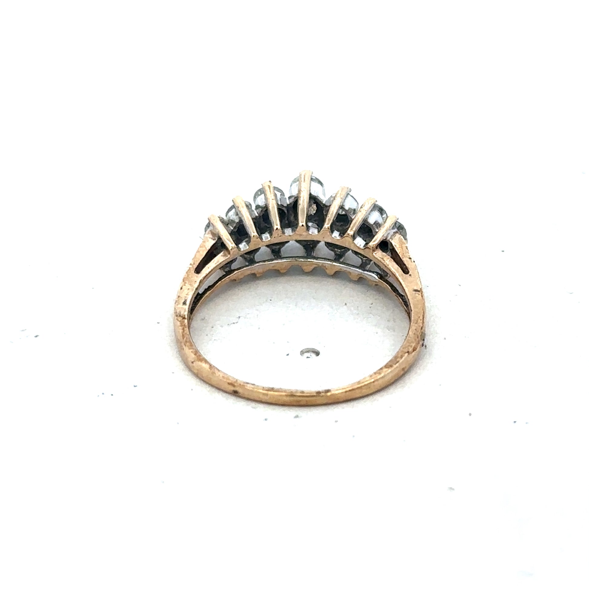 9ct yellow gold ring in size N1/2 featuring a simple band design, crafted by Reeves and Sons.
