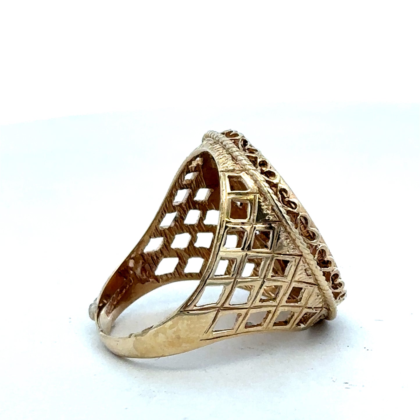 9ct yellow gold sovereign ring with 1897 full sovereign design, size X, by Reeves and Sons, detailed engraved pattern visible.