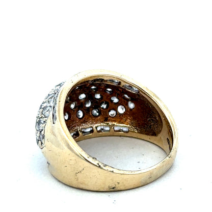 9ct yellow gold ring size U by Reeves and Sons, close-up showing polished band with smooth finish.