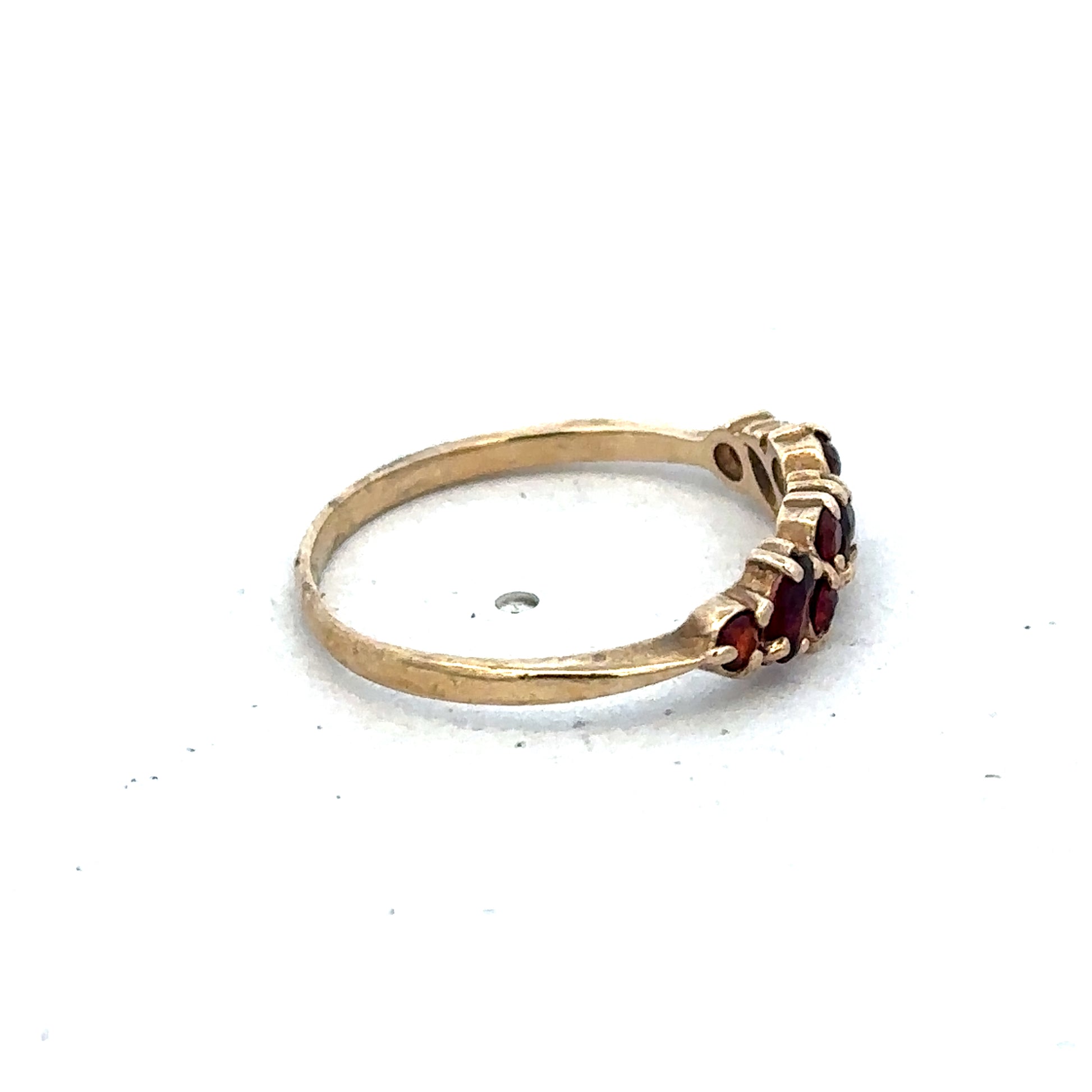 9ct yellow gold ring size N from Reeves and Sons, showcasing a smooth polished band.