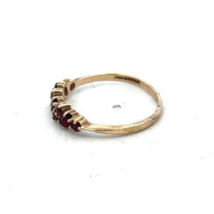 9ct yellow gold ring size N with a smooth band, crafted by Reeves and Sons, displayed on a neutral background.