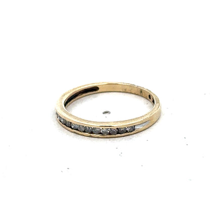 9ct yellow gold diamond half eternity ring in size N with sparkling diamonds, crafted by Reeves and Sons.
