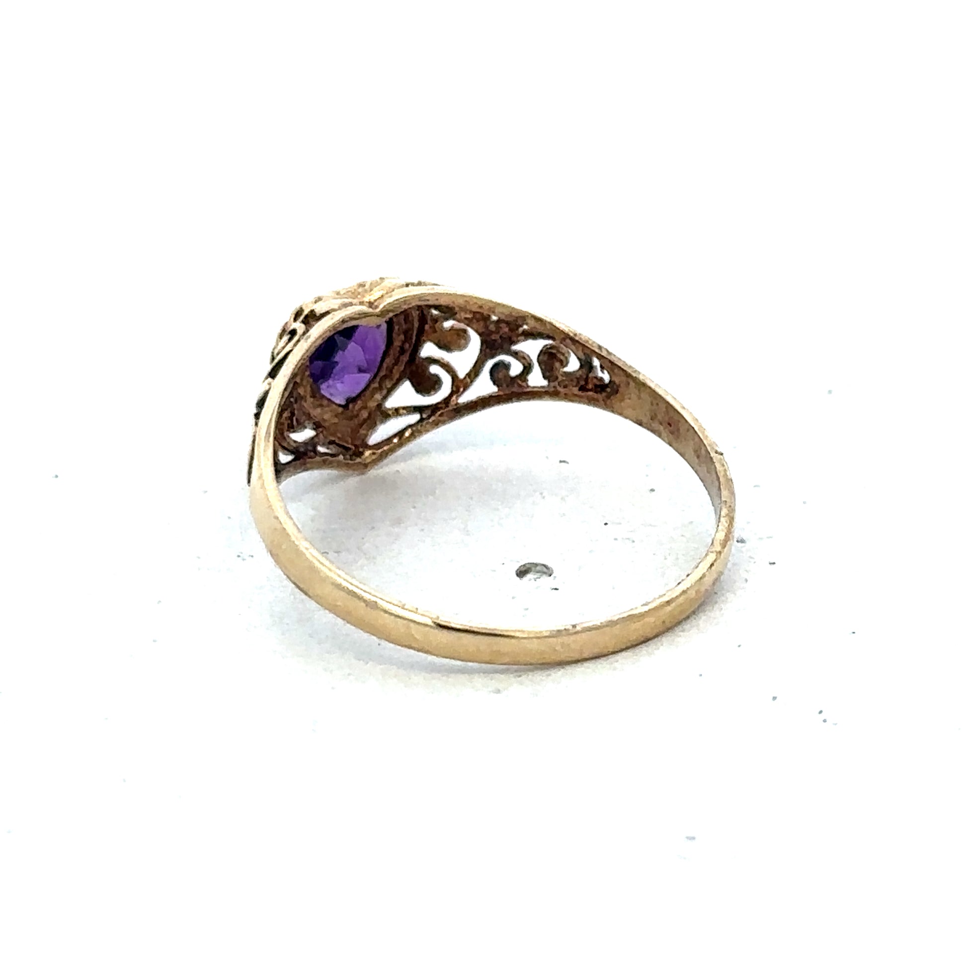 9ct yellow gold ring in size Q by Reeves and Sons, featuring a smooth polished band and elegant design.