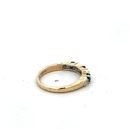 9ct yellow gold sapphire and diamond ring, size M 1/2, with intricate band design, from Reeves and Sons.