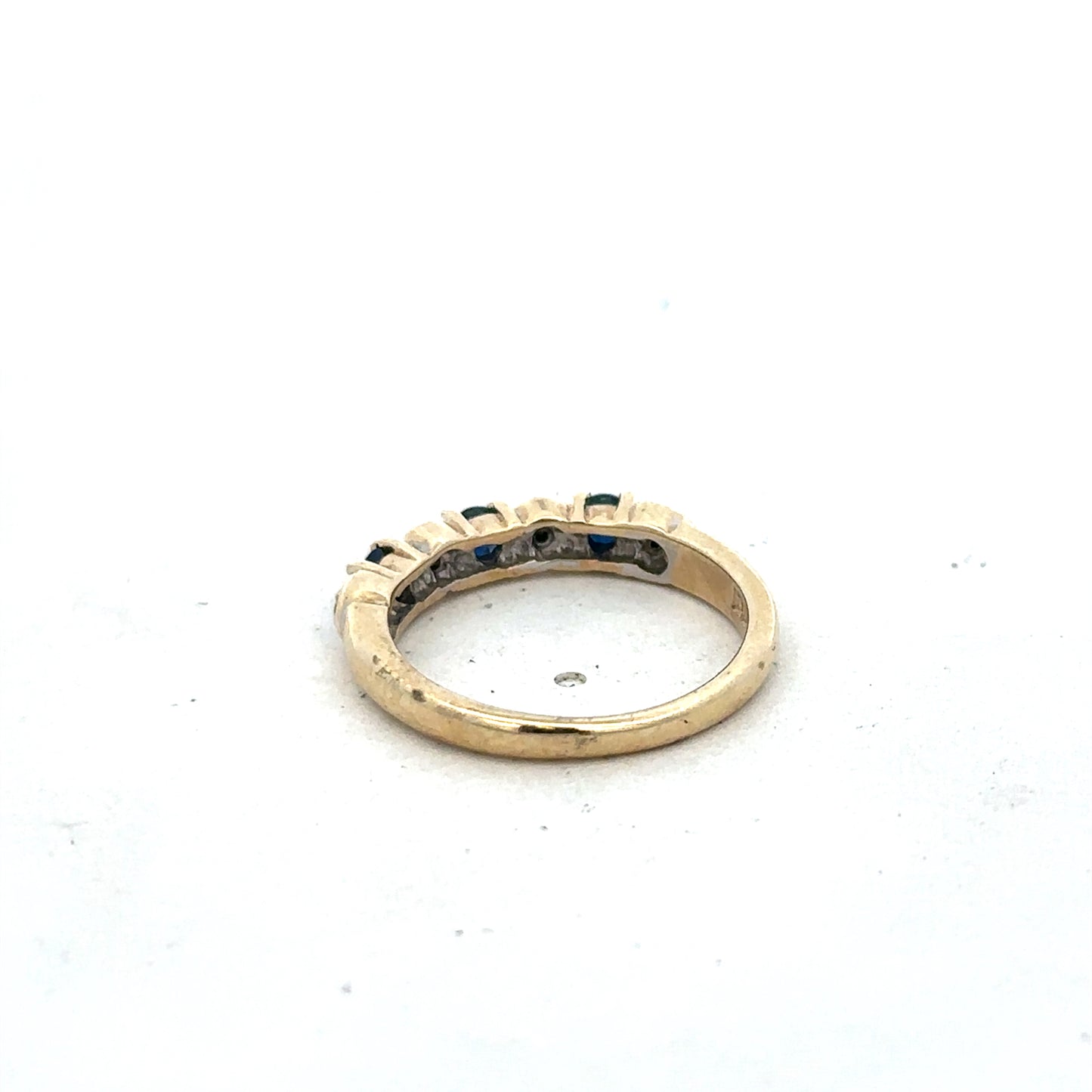 9ct yellow gold sapphire and diamond ring in size M 1/2, featuring a floral design and intricate gemstone settings.