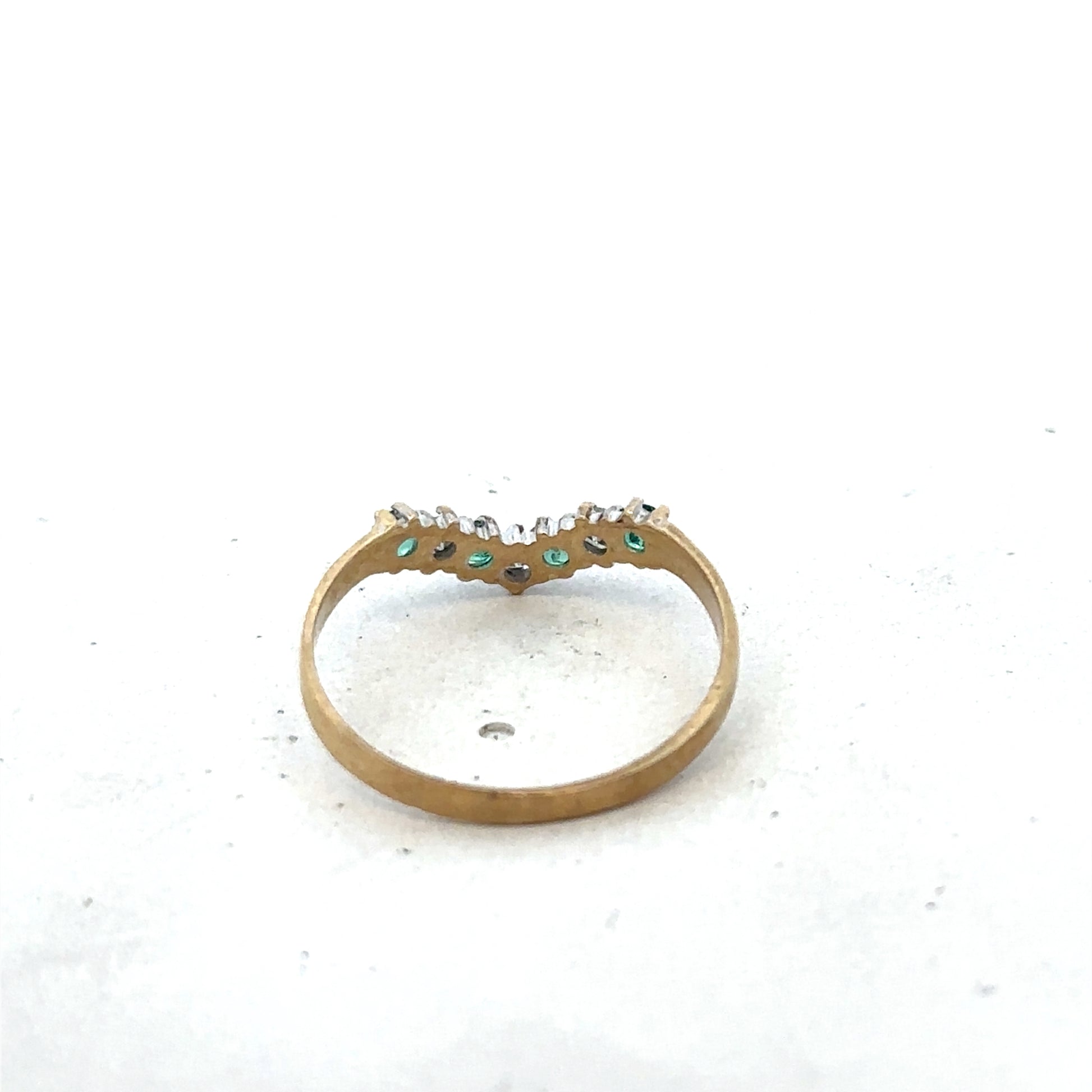 9ct yellow gold emerald and diamond ring featuring intricate design, size O1/2, by Reeves and Sons.