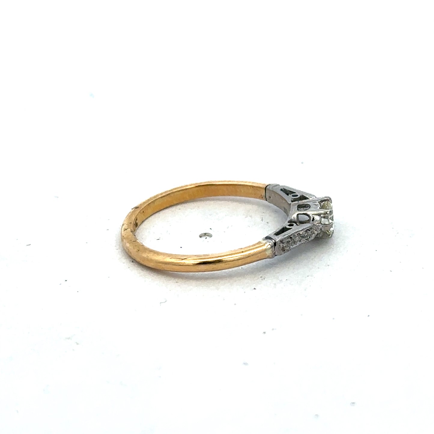 18ct yellow gold diamond ring with a sparkling central diamond, size O, crafted by Reeves and Sons.