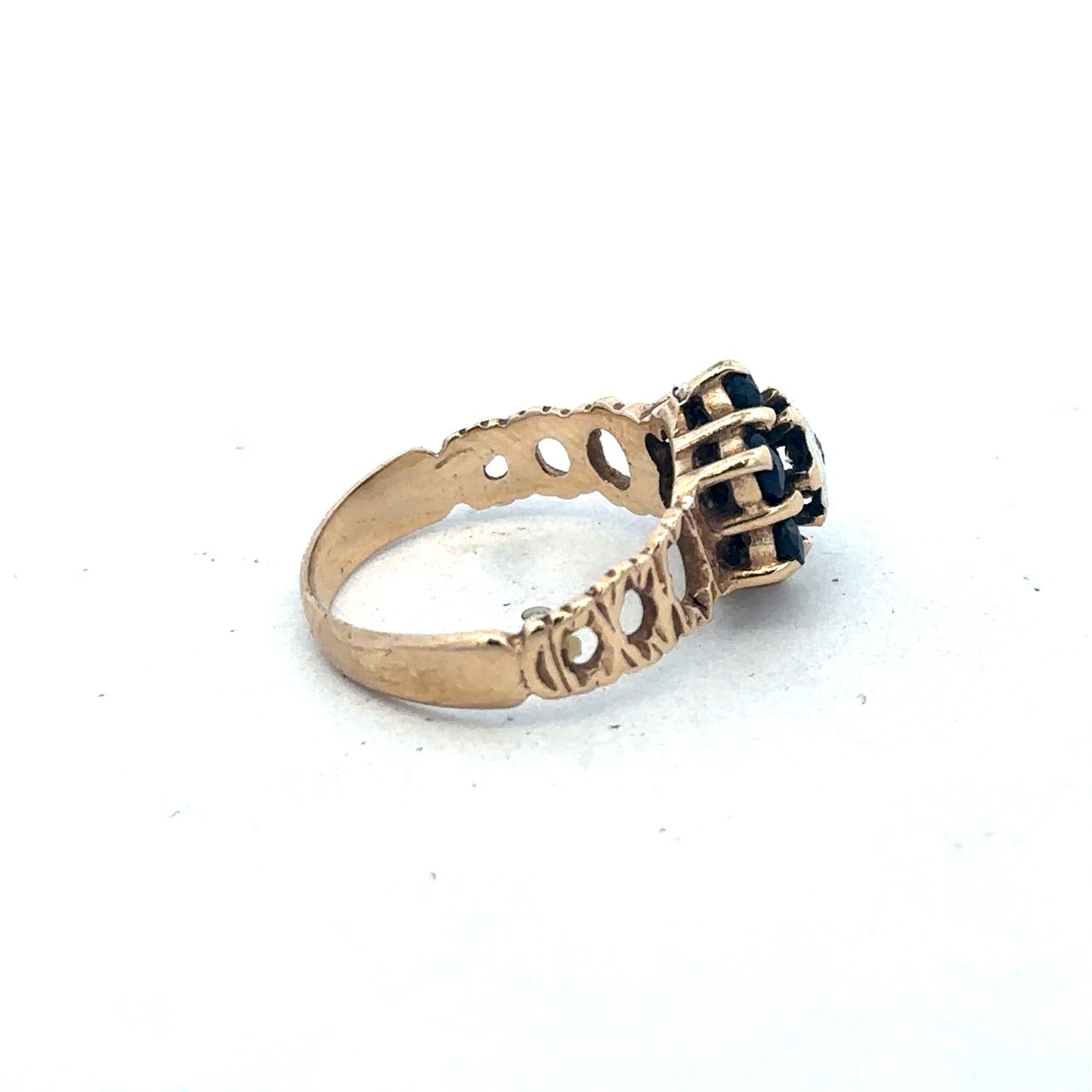 9ct yellow gold sapphire and diamond ring in size M, featuring a central sapphire gemstone with diamond accents, by Reeves and Sons.