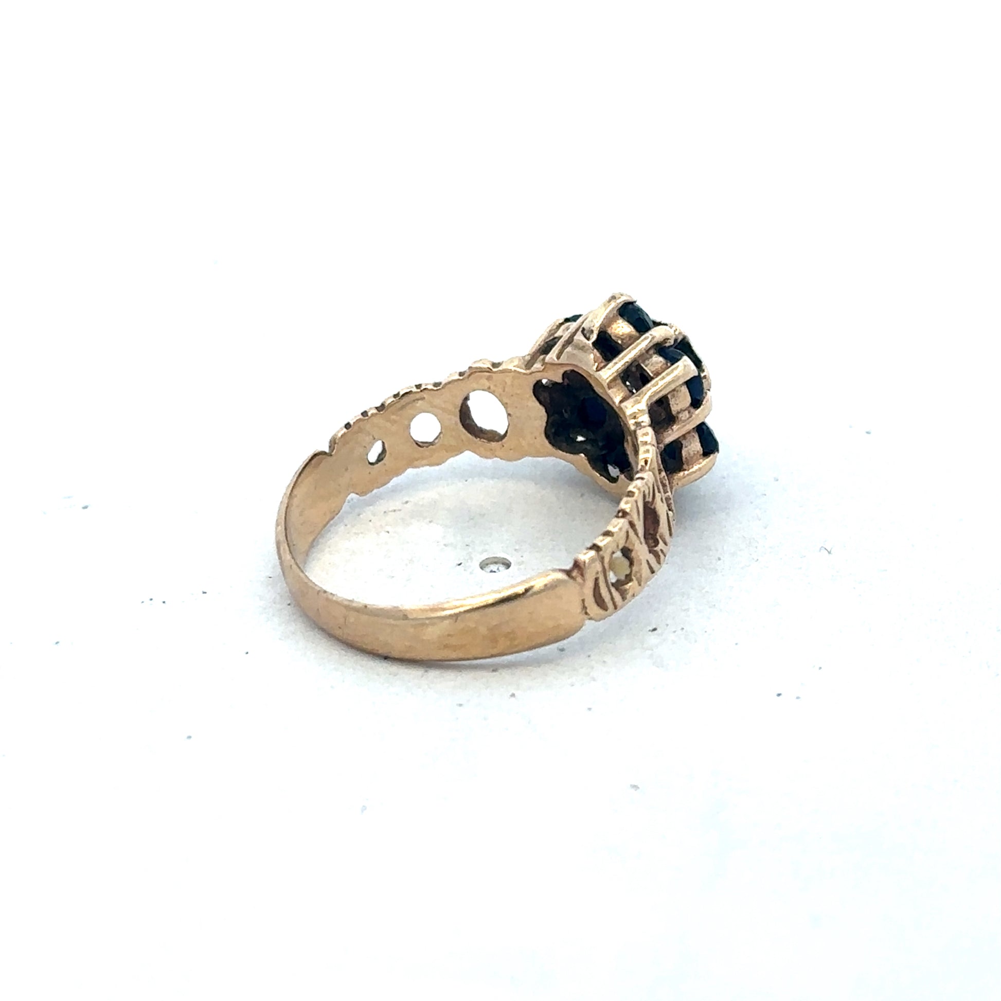 9ct yellow gold sapphire and diamond ring, size M, featuring a central sapphire with diamond accents, designed by Reeves and Sons.